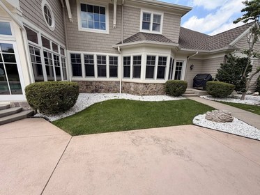 Craftsman home with fresh landscape beds