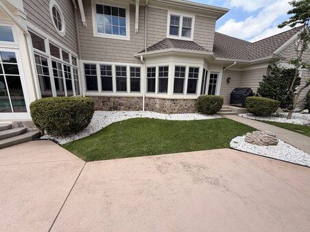 Craftsman home with fresh landscape beds