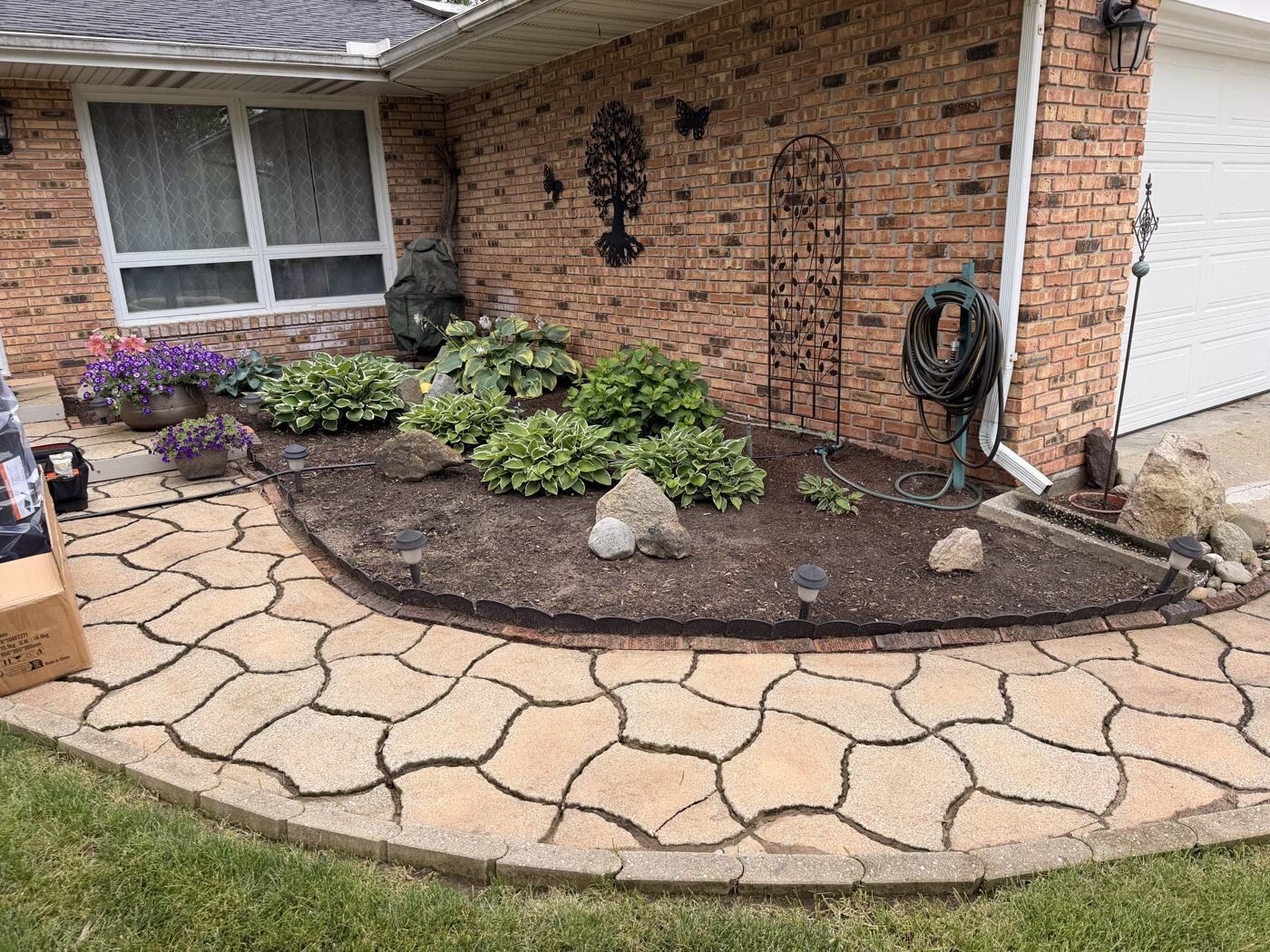 Custom flagstone walkway installed by Covenant Lawn and Landscape in Elkhart, IN