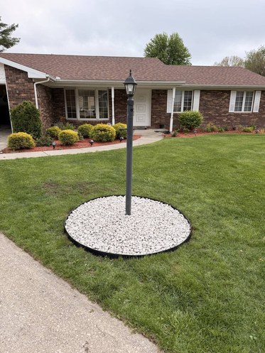 Clean stone tree ring and fresh edging